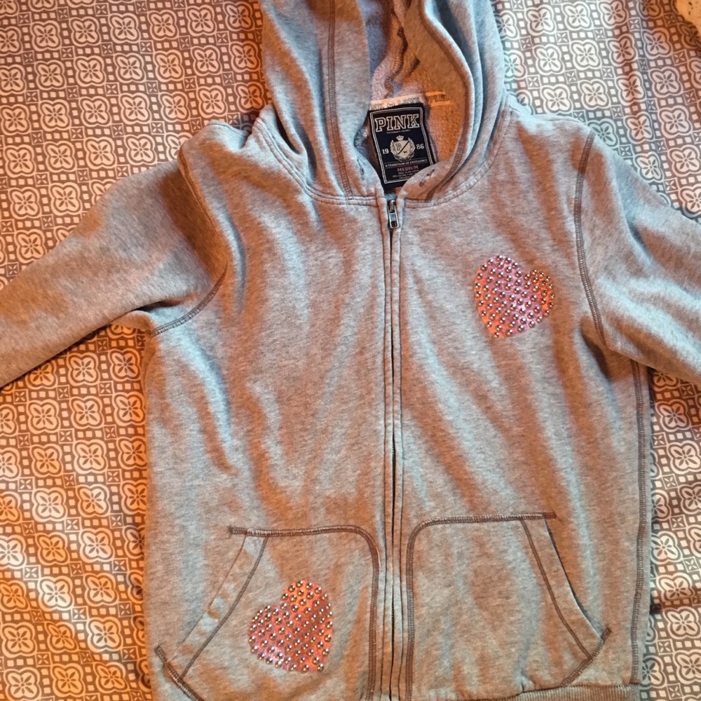 VS  Pink hoodie.